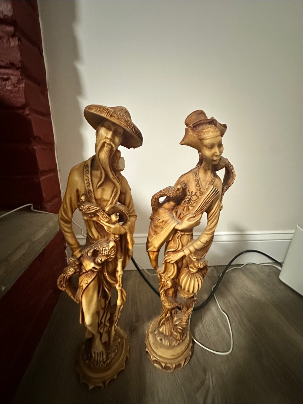 Carved Oriental Figurine Pair in Gold Tone
